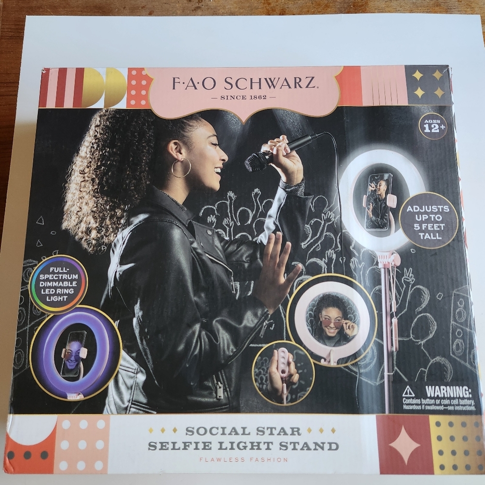 Illuminate your photography with the FAO Schwarz Social Star Selfie Light Stand,